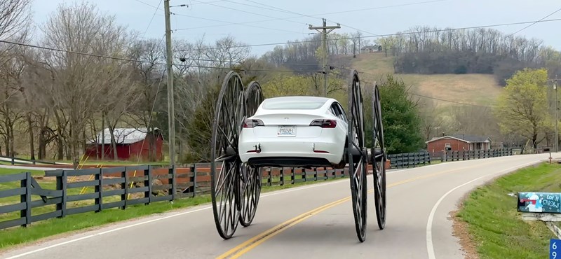 A YouTuber Mounted Car Wheels On It, Then Driving A Tesla Upside Down, Finally Rolling It Down A Hill - VIDEO